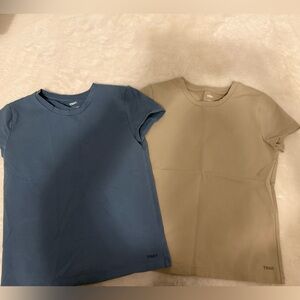 Bue and Tan TNA t shirts